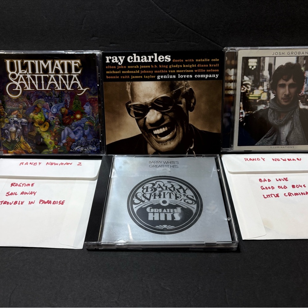 Music CD Collection with Ray Charles and Santana